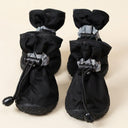 Black waterproof anti-slip rain boots for small dogs & cats, studio photo