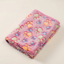 Pink fleece pet blanket with paw print design for cats & dogs, studio photo