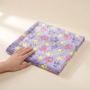 Purple fleece pet blanket with paw print design for cats & dogs, scale photo
