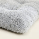 Close-up of the soft plush fabric on the dog and cat bed