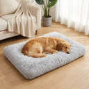 Pet resting on the soft plush bed at home