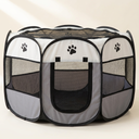 White and grey foldable octagonal pet playpen on a cream background