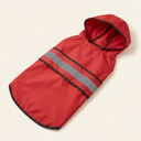 Red waterproof dog raincoat with hood for small to large dogs, studio photo