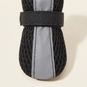 Black breathable mesh dog boots with reflective straps for dogs, detail photo