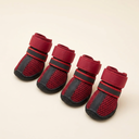 Red breathable mesh dog boots with reflective straps for dogs, studio photo