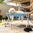 Dog held steady in the grooming hammock during grooming