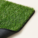 Close-up of the artificial grass surface on the dog pee pad