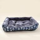 Blue square pet bed cushion on a cream background