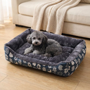 Pet resting on the square cushion bed at home