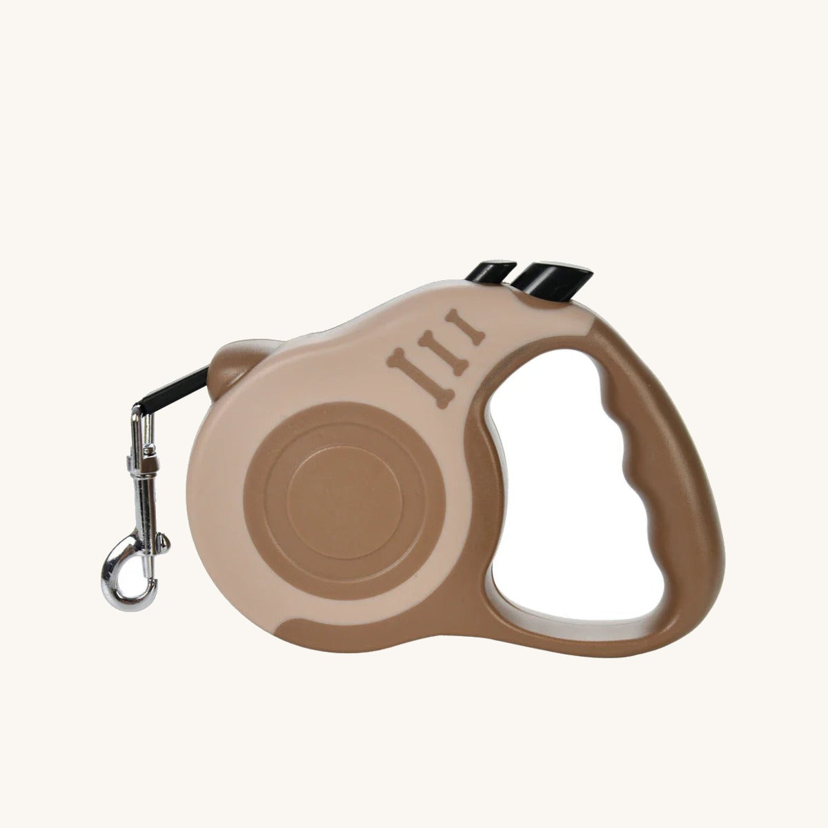 Retractable Dog Lead handle detail on cream background