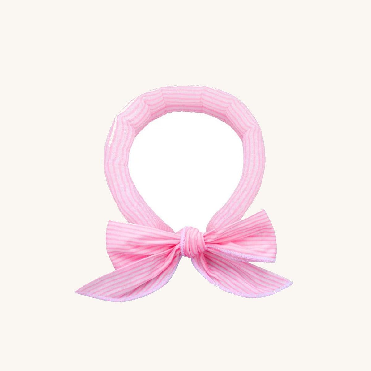 Pink dog cooling neck wrap on a cream background — My Petsworth