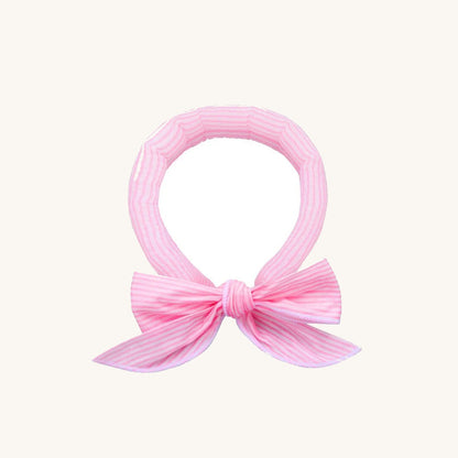 Pink dog cooling neck wrap on a cream background — My Petsworth
