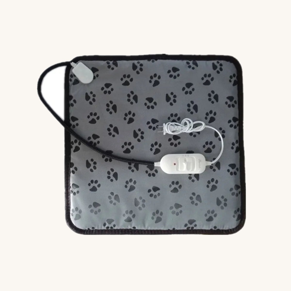 Heated pet pad showing the sleeved cable — My Petsworth