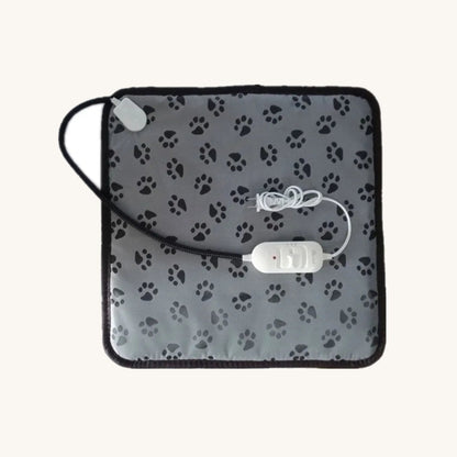 Heated pet pad showing the sleeved cable — My Petsworth