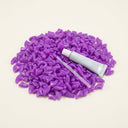 Purple soft nail caps for cats with adhesive glue, studio photo
