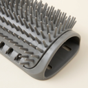 Grey wall-mounted grooming brush & scratcher comb for cats, detail photo