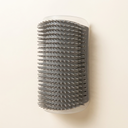 Grey wall-mounted grooming brush & scratcher comb for cats, studio photo