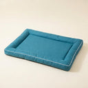 Blue chew-proof waterproof crate mat for large dogs, studio photo