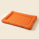 Orange chew-proof waterproof crate mat for large dogs, studio photo