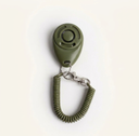 Olive dog training clicker with adjustable wrist strap, studio photo