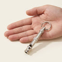 adjustable pitch dog training whistle with keychain, scale photo