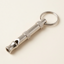 adjustable pitch dog training whistle with keychain, studio photo