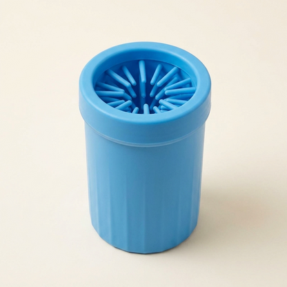 Blue dog paw cleaner cup on cream background — My Petsworth