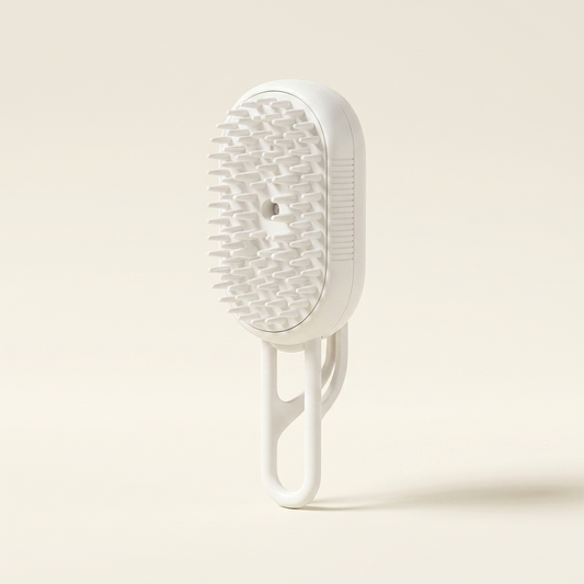 White cat grooming brush with mist spray on a cream background — My Petsworth
