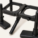 Close-up of the adjustable legs and bowl cut-outs on the elevated dog feeder