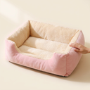 Pink cushioned cat bed for cats, scale photo