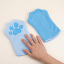 Blue microfibre dog grooming glove for quick-drying baths, scale photo