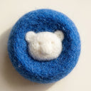 Blue reusable pet hair remover laundry ball for washing machines, detail photo