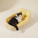 Yellow plush oval cat bed with lace trim for small dogs & cats, studio photo