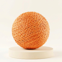 Orange sisal scratch ball toy with jingle bell for cats, studio photo