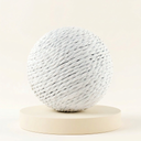 White sisal scratch ball toy with jingle bell for cats, studio photo