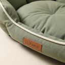 Fabric and stitching detail of the green soft dog bed cushion