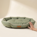 Green soft dog bed cushion shown to scale