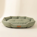 Green soft dog bed cushion, studio photo