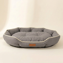 Grey soft dog bed cushion, studio photo