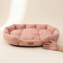 Pink soft dog bed cushion shown to scale