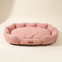 Pink soft dog bed cushion, studio photo