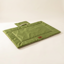 Green portable waterproof chew-resistant mat for dogs & cats, studio photo
