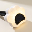 Close-up of the solar panel on the paw print garden light