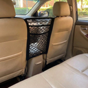 Black elastic mesh car barrier with storage bag for dogs, lifestyle photo