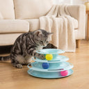Blue 4-tier rotating ball track tower for cats, lifestyle photo