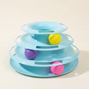 Blue 4-tier rotating ball track tower for cats, studio photo