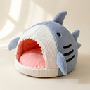 Blue shark-shaped cave bed for dogs & cats, studio photo