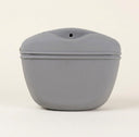 Grey silicone training pouch with magnetic lid for dogs, studio photo