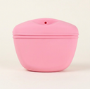 Pink silicone training pouch with magnetic lid for dogs, studio photo