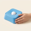 Blue slow feeder bowl with maze grooves for dogs & cats, scale photo